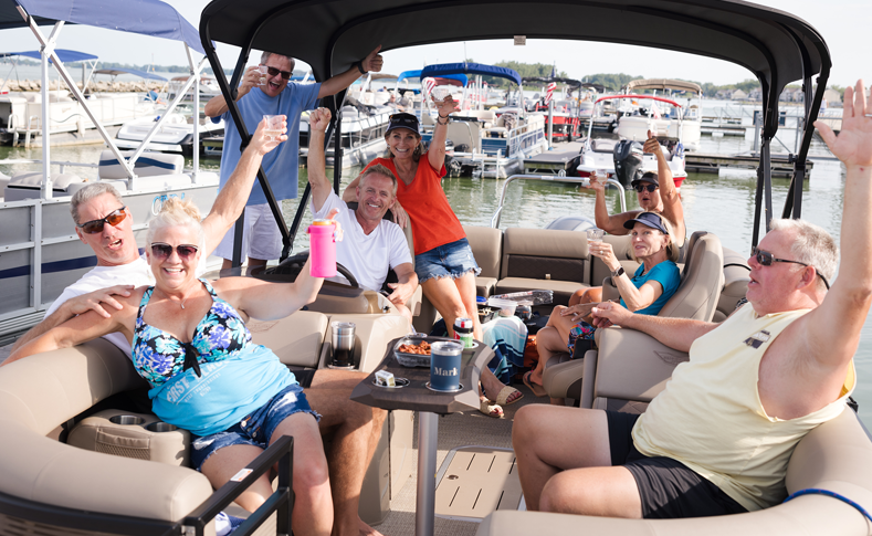 People having fun on a pontoon boat on Grand Lake St. Marys Ohio