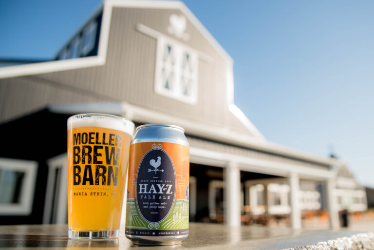 The outside of Moeller Brew Barn with a craft beer